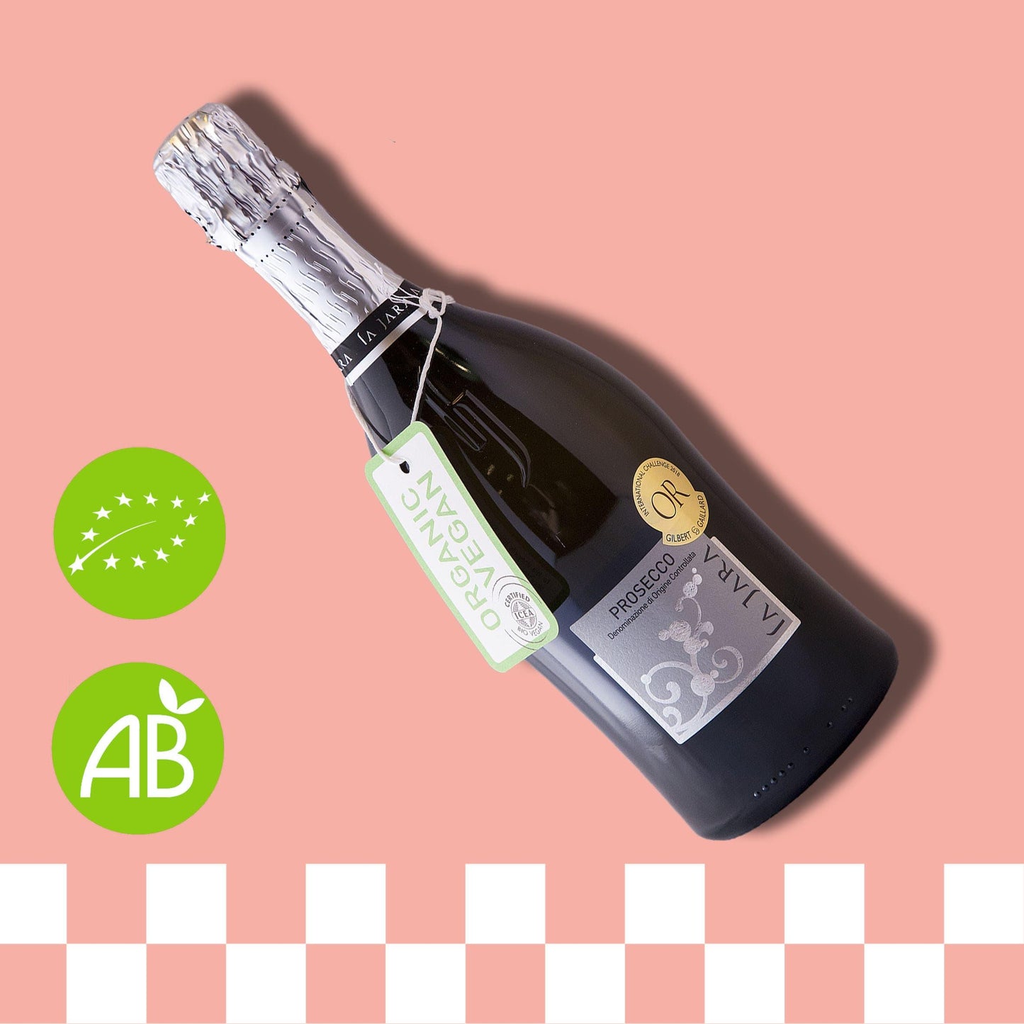 Prosecco bouteille sur fond rose