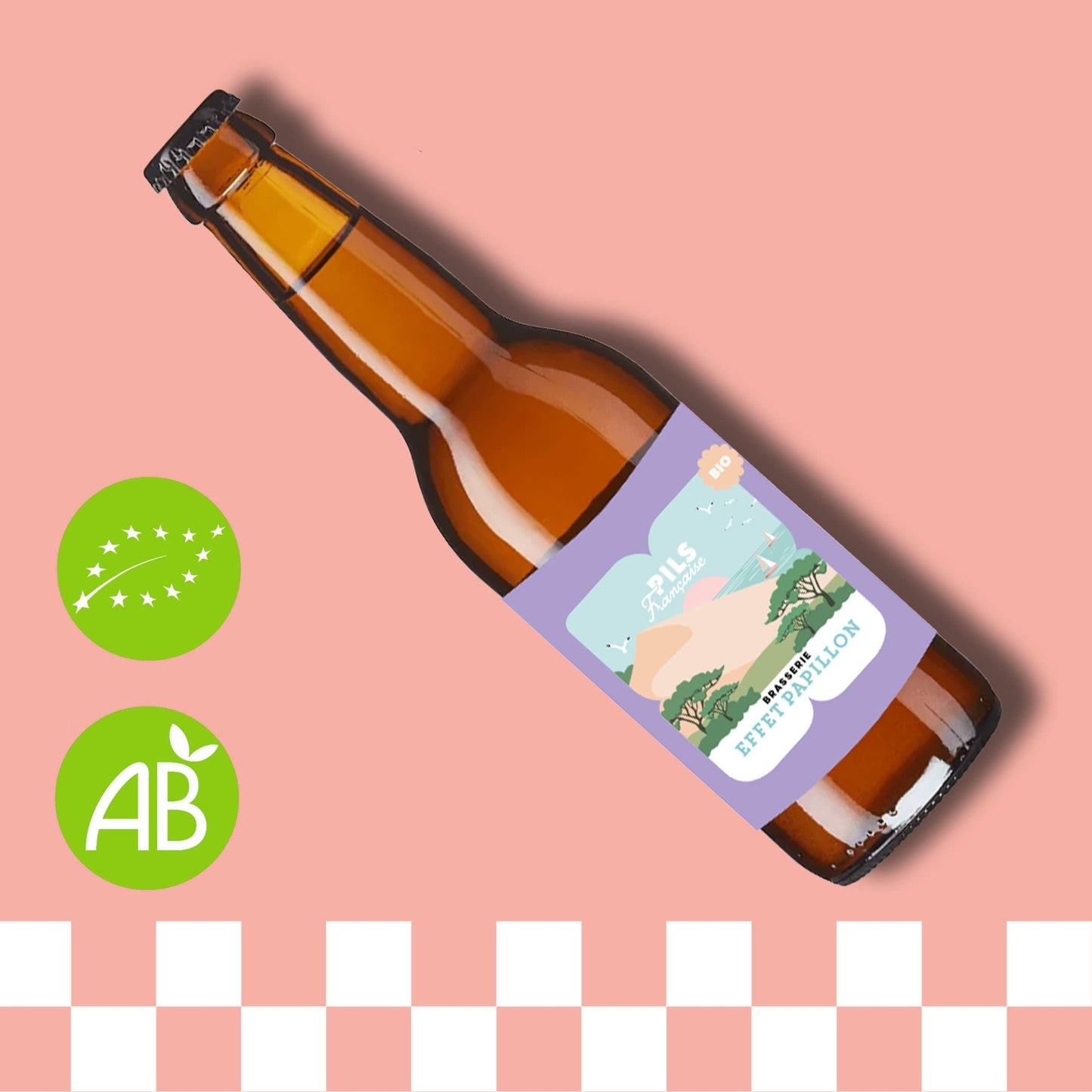 Bière Pils bouteille sur fond rose